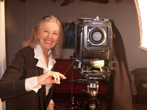 Elizabeth Berg posing with a camera